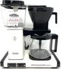A white and black Moccacoffee maker is shown against a white background. Produktbild-Vorschau