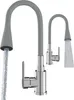 Two kitchen faucets, one in the foreground with water flowing, and another smaller one in the background. Podgląd zdjęcia produktu