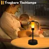 A mother is breastfeeding her baby at night, with a portable table lamp providing soft illumination. Anteprima dell’immagine prodotto
