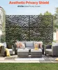 An outdoor patio scene with a sofa, chairs, ottomans, and a decorative privacy screen. Náhľad obrázku produktu