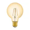 A close-up studio shot of a vintage-style LED light bulb with an amber-tinted glass globe and a gold-colored screw base. Produktbild-Vorschau