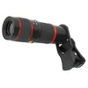 A black and red zoom lens with a clip attachment, isolated on a white background. Náhled obrázku produktu