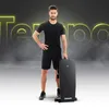 A man stands next to a folded fitness bench with a smoky, dark background and glowing text. Náhľad obrázku produktu