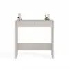A minimalist beige desk with two drawers, set against a white background. Small cosmetic bottles are placed on top of the desk. Anteprima dell’immagine prodotto