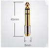A product shot of a gold and silver audio adapter with dimensions indicated. Anteprima dell’immagine prodotto