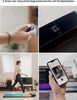 Collage of images showing a person using a treadmill, a close-up of a remote control, a display screen, and a smartphone app. Produktbild-Vorschau