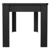 A black rectangular dining table with fluted legs, shown from the front on a white background. Anteprima dell’immagine prodotto