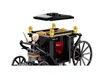 A close-up of a LEGO Harry Potter carriage with a minifigure driving it. Náhled obrázku produktu
