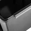 A close-up view of the corner of a black storage box with a silver trim. Anteprima dell’immagine prodotto