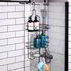 A shower caddy hanging on a glass shower door, filled with various bottles and a bar of soap. Anteprima dell’immagine prodotto