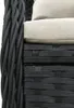 Close-up of a black rattan chair with a beige cushion. Produktbild-Vorschau