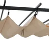 A close-up view of a beige fabric canopy attached to a black metal pergola structure. Produktbild-Vorschau