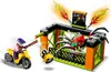 A LEGO City Stunt Park set featuring a motorcycle, a spider cage, and a minifigure. Podgląd zdjęcia produktu
