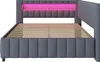 A side view of a dark gray upholstered bed frame with a pink LED light strip at the headboard. Náhled obrázku produktu
