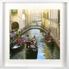 A canal in Venice with gondolas and people. Náhled obrázku produktu