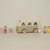 A wooden toy camper van with accessories and figures. Náhled obrázku produktu