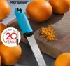 A Microplane zester with oranges and orange zest on a wooden cutting board. Anteprima dell’immagine prodotto