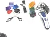 A collection of hair cutting accessories including a clipper, scissors, and various comb attachments, laid out on a white surface. Produktbild-Vorschau