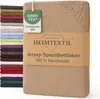 A product package for a jersey fitted sheet, with a stack of fabric swatches in various colors to the left. Produktbild-Vorschau