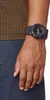 A close-up shot of a person's wrist wearing a black Casio G-Shock watch. Produktbild-Vorschau