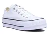 A white Converse Chuck Taylor All Star Lift Ox sneaker is shown from a side angle against a white background. Voir les images du produit