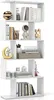 A white, multi-tiered bookshelf filled with decorative items and books. Produktbild-Vorschau