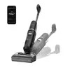A black Tineco Floor ONE S7 Stretch Ultra wet dry vacuum cleaner is shown on a white background, with a smartphone displaying the product's app in the upper left corner. Multiple faded images of the vacuum cleaner are also visible, suggesting movement or d Produktbild-Vorschau
