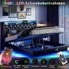 A modern black bed frame with integrated LED lighting, showcasing its storage capabilities and remote control features. Náhľad obrázku produktu