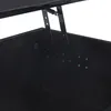 Close-up view of the interior of a black storage ottoman, showing the lifting mechanism. Produktbild-Vorschau