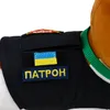 Close-up of a black vest with patches, including the Ukrainian flag and the word 'Patron' in Cyrillic. Produktbild-Vorschau
