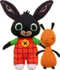Two plush toys, a rabbit and a small orange creature, are shown against a white background. Voir les images du produit