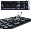 A split image showing a black silicone keyboard and then the same keyboard with water splashing on it. Produktbild-Vorschau