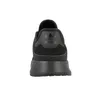 The back view of a black Adidas sneaker. Podgląd zdjęcia produktu