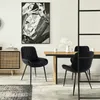 A dining room scene with a table and chairs. Náhľad obrázku produktu