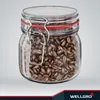 A glass jar filled with coffee beans, with a wire bail closure and a red rubber seal. Produktbild-Vorschau