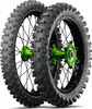 Two motorcycle tires with green hubs are shown against a white background. Náhľad obrázku produktu