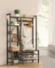 A well-lit entryway or hallway with a tall shelving unit and coat rack, featuring shoes, bags, plants, and decorative items. A window with sheer curtains is visible in the background. Náhled obrázku produktu