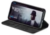 A smartphone in a black flip case, displaying a movie poster on its screen. Produktbild-Vorschau