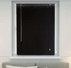 A black aluminum blind is shown in a window frame, covering the glass. Produktbild-Vorschau