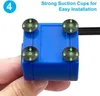 A hand is holding a blue pump with four suction cups attached, demonstrating how to install it. Produktbild-Vorschau