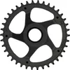 A black bicycle chainring with cutouts and teeth, isolated on a white background. Produktbild-Vorschau
