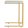 A gold metal C-table with a clear glass top on a white background. Podgląd zdjęcia produktu