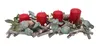 A Christmas advent candle arrangement with four red candles on a base of twigs, decorated with eucalyptus leaves, pine cones, and small white berries. Produktbild-Vorschau