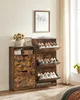 A wooden shoe cabinet with multiple shelves and drawers is placed in a room with a window. Produktbild-Vorschau