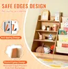 A wooden bookshelf for children, with various safety features highlighted through text and graphics. Náhled obrázku produktu