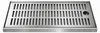 A stainless steel drip tray with a perforated surface and a circular drain hole on the right side. Produktbild-Vorschau