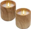 Two LED candles in wooden holders are shown against a white background. Voir les images du produit