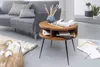 A living room scene featuring a couch, coffee table, and basket. Voir les images du produit