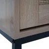 A close-up view of the bottom corner of a shoe cabinet, showing the wood grain texture and the black metal legs. Anteprima dell’immagine prodotto