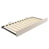A beige upholstered bed frame with a wooden slat support system, shown from a diagonal angle against a white background. Podgląd zdjęcia produktu
